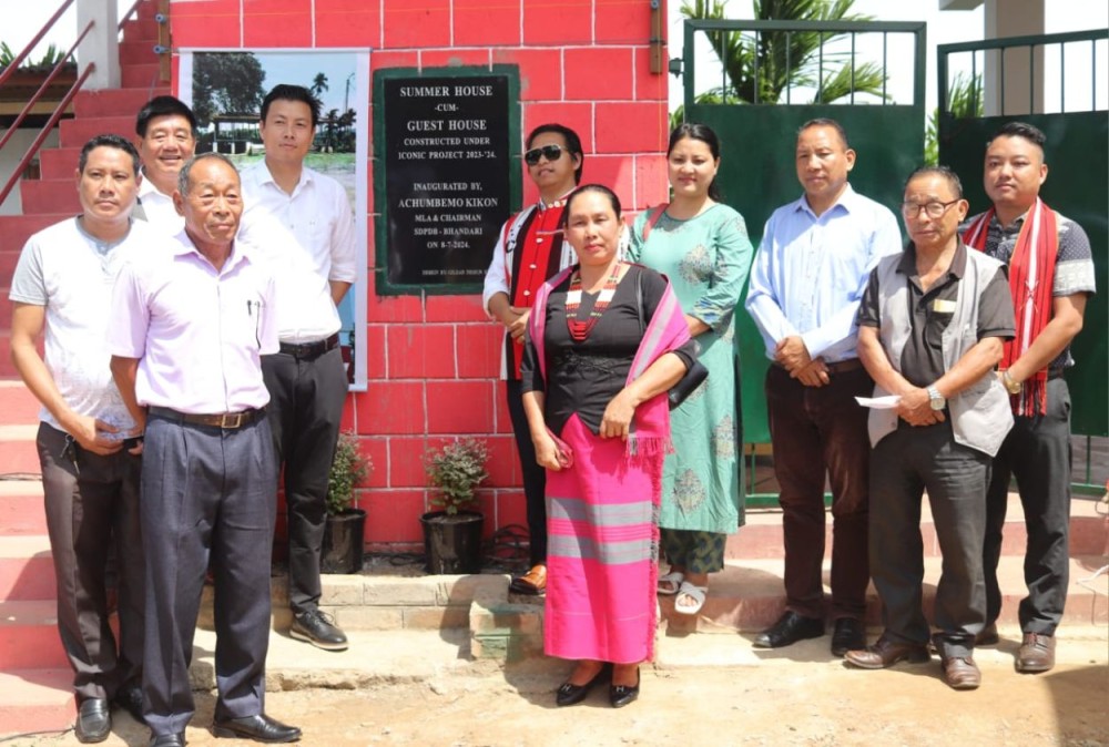 MLA 40 AC Bhandari Achumbemo Kikon unveiling the plague of the newly constructed three room summer house-cum-guest house constructed under LADP Iconic Project 2023-2024 during its inaugural programme at Bhandari HQ on July 8. (DIPR Photo)